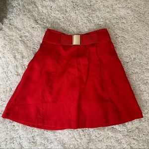 Red buckle skirt